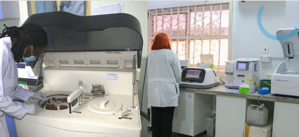 Laboratory scientists working with clinical analysers at Nisa Premier Hospital
